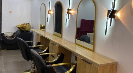 Elegant salon setup with chairs and mirrors at Glamor Nails and Beauty in Ikeja, Lagos, NG.