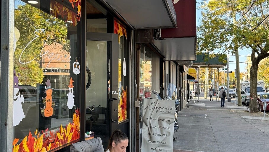 Street view of dawa.brows in New York, New York, US, showcasing vibrant window decorations.