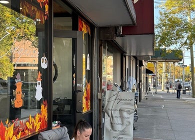 Street view of dawa.brows in New York, New York, US, showcasing vibrant window decorations.