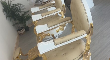 Elegant salon chairs in Bychloeleigh, Wales, Wales, GB, showcasing luxury and style.