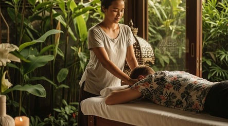 Relaxing massage at ELEXOIR HOME MASSAGE SERVICE UBUD, Bali, Bali, ID with lush green surroundings.