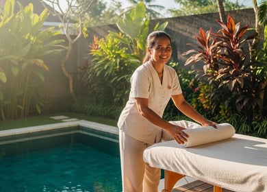 Relaxing outdoor massage setup at ELEXOIR HOME MASSAGE SERVICE UBUD, Bali, Bali, ID with lush greenery.