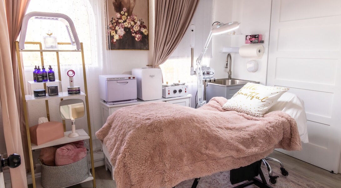 Cozy beauty treatment room at Vanity Artistry in Winter Park, Florida, US offers serene ambiance and comfort.
