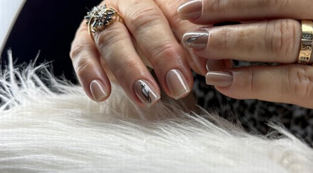 Close-up of elegant nail art from Ailen Nails, Louisville, Kentucky, US, showcasing a chic manicure style.