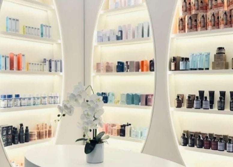 Elegant product display at Hair Colosseum Beauty Salon in Dubai, AE featuring a variety of beauty essentials.