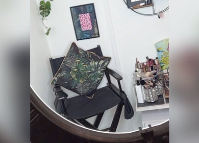 Cozy makeup corner at Little Beauty Secrets, Cowdenbeath, Scotland with chair and beauty products.