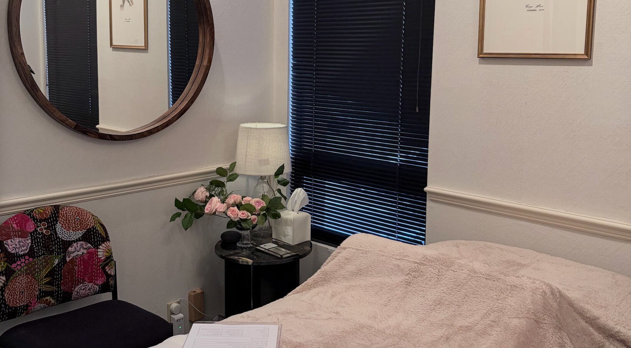 Tranquil treatment room at SKIN ESTHETIC SRQ, Sarasota, Florida, US, featuring a cozy bed and elegant decor.