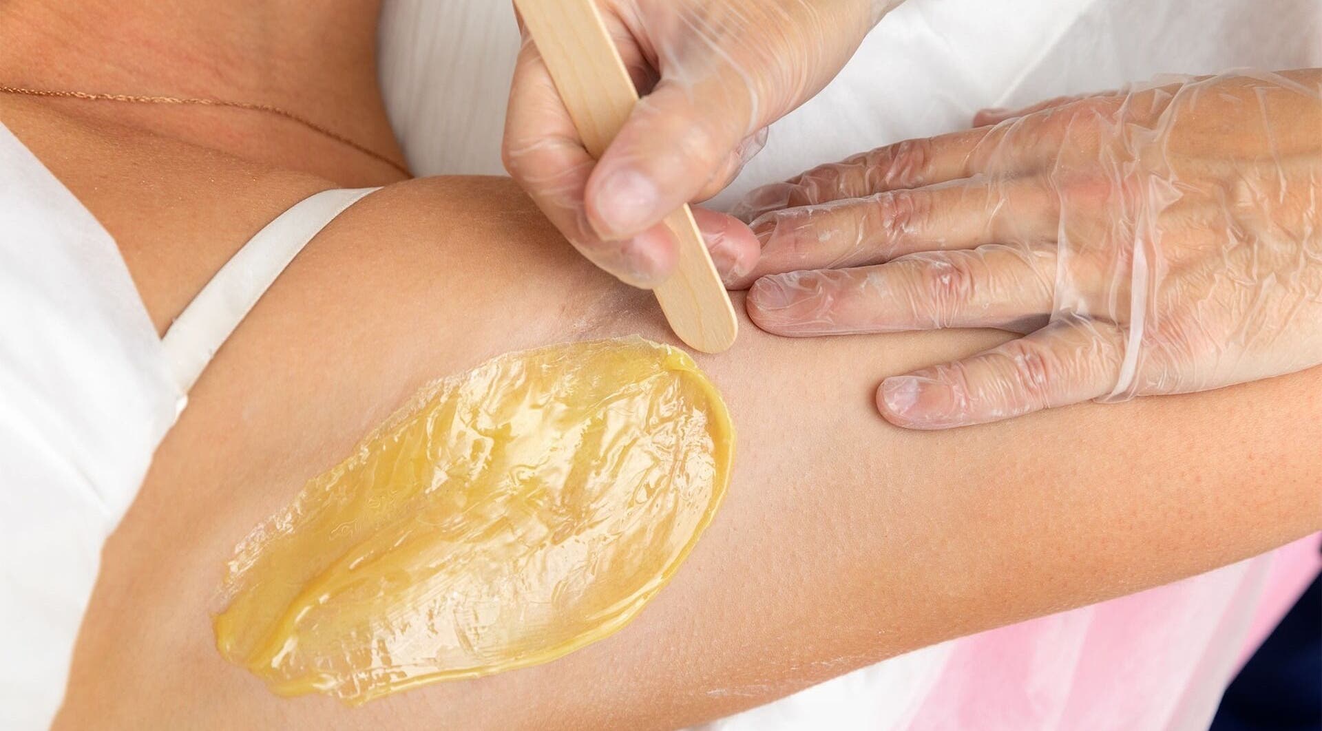 Arm waxing at ND Esthetics 246, BB showcases precision and care for flawless skin.