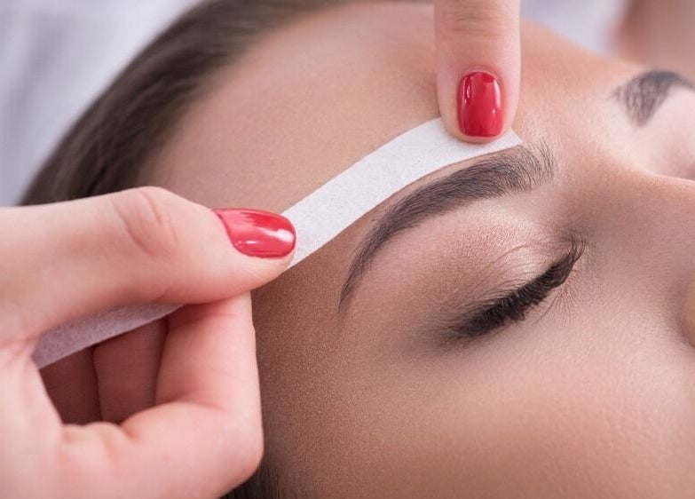 Expert eyebrow shaping at ND Esthetics 246, BB, enhancing beauty with precision.