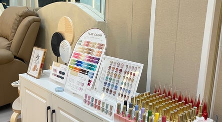 Vibrant nail polish display at Diva nailslash in Krung Thep Maha Nakhon, showcasing a variety of nail colors.