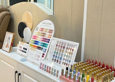 Nail polish displays at Diva Nailslash, Krung Thep Maha Nakhon, featuring vibrant color options.