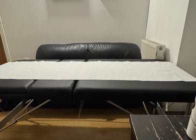 Comfortable massage table at X-X, London, England, GB. Experience relaxation and wellness here.