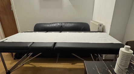 Comfortable massage table at X-X, London, England, GB. Experience relaxation and wellness here.