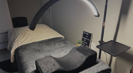Relaxing treatment room at Blaauwtiful brows & lashes in Pretoria, Gauteng, ZA with a comfy bed and soft lighting.
