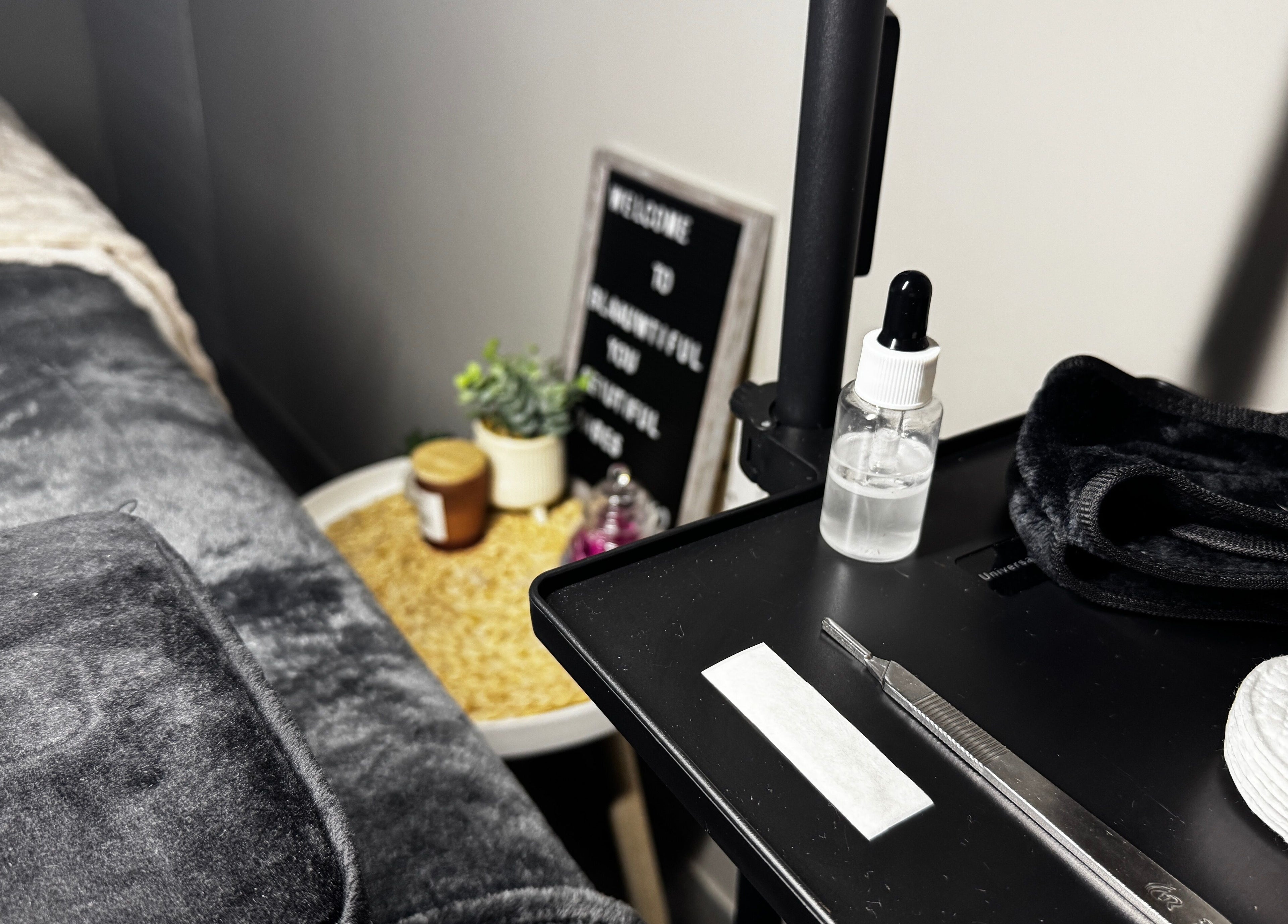 Calming treatment setup at Blaauwtiful Brows & Lashes in Pretoria, Gauteng, ZA, featuring tools and cozy decor.