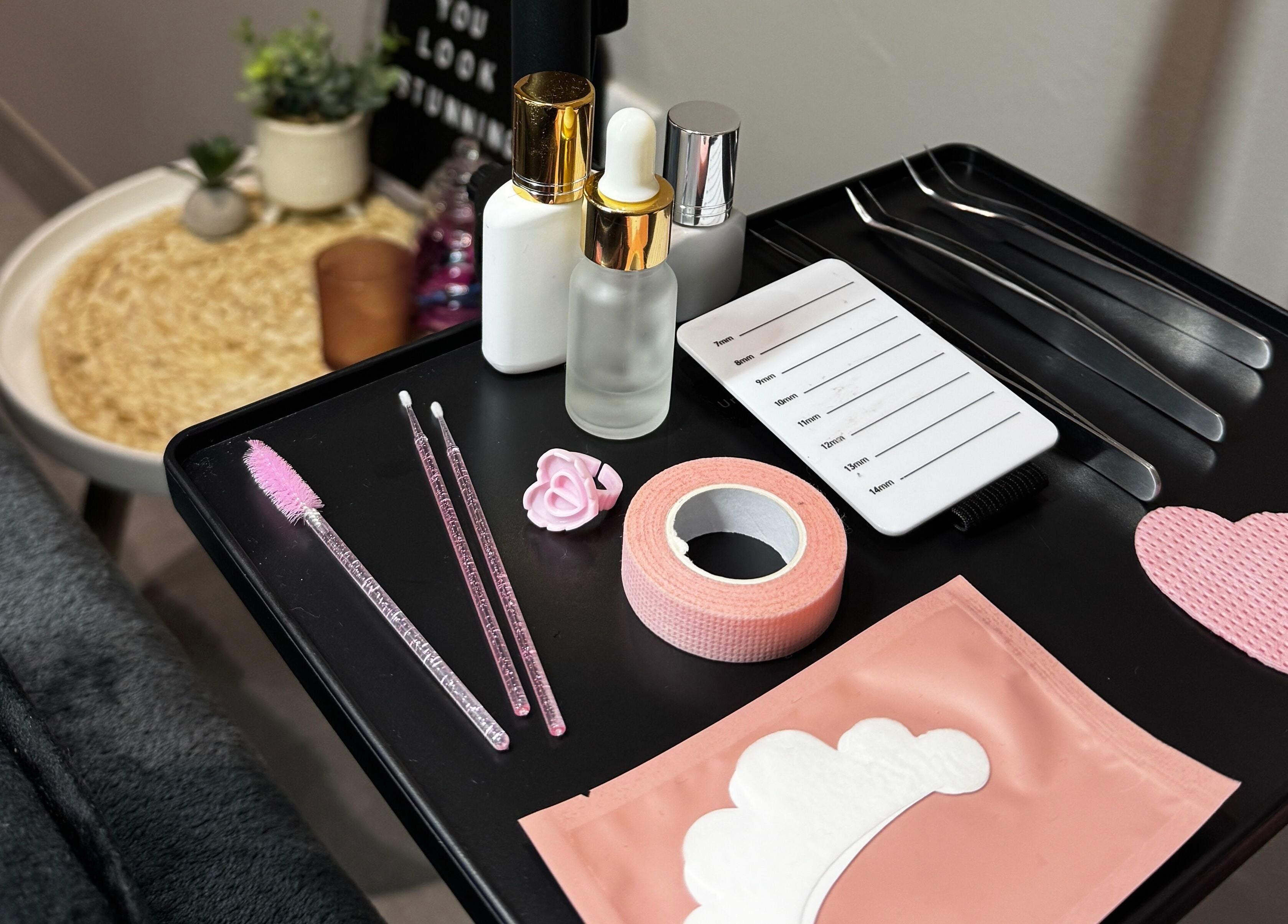 Lash tools and products at Blaauwtiful Brows & Lashes, Pretoria, Gauteng, ZA, showcasing a chic workspace.