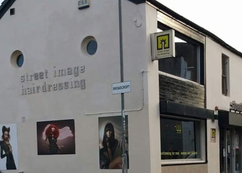 Exterior of By Louise Bamford salon in Kirkintilloch, Scotland, GB, showcasing stylish hairdressing artworks.