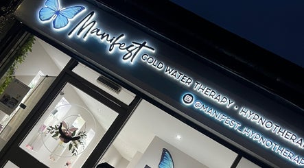 Exterior of Manifest Hypnotherapy in Kirkintilloch, Scotland, GB, showcasing a calming blue butterfly sign.