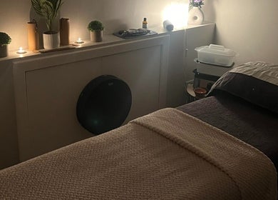Cozy therapy room at Manifest Hypnotherapy, Kirkintilloch, Scotland, with a soft-lit ambiance and calming decor.