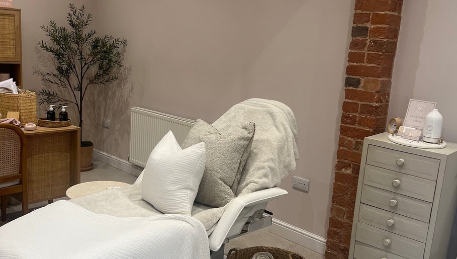 Cozy beautician space at Georgia Bea Manicurist, Nether Broughton, England, GB with plush cushions and decor.