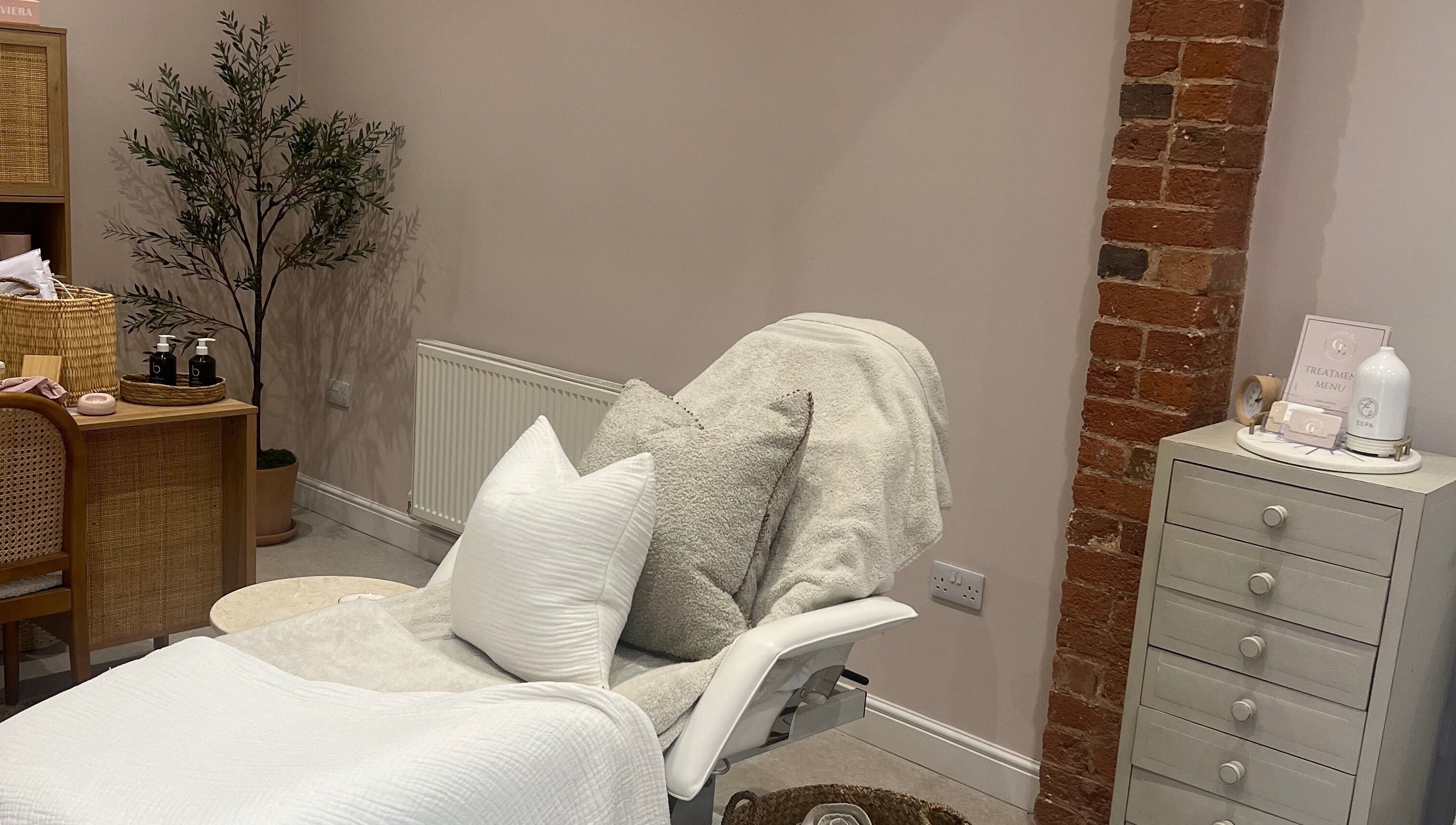 Cozy beautician space at Georgia Bea Manicurist, Nether Broughton, England, GB with plush cushions and decor.