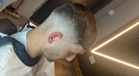 Close-up of a trendy fade haircut at Rowan Thomas Hair, County Wicklow, County Wicklow, IE.