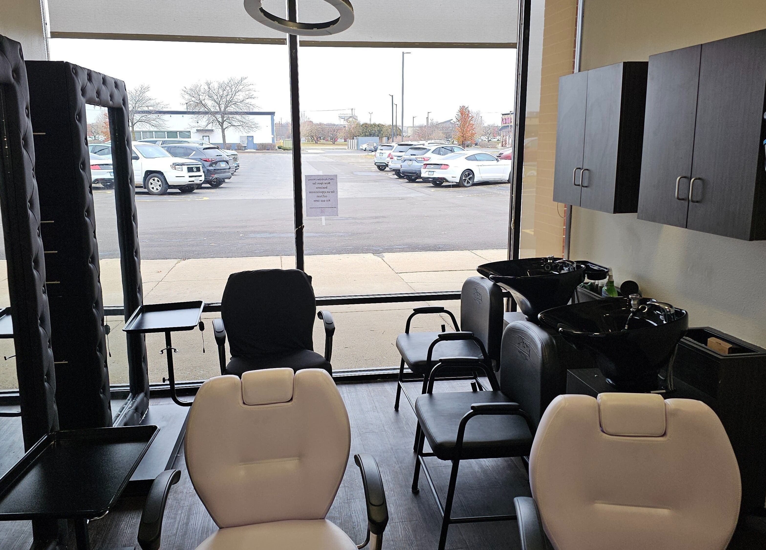 Modern salon interior at MICKnifEcYnt Artistry in Oswego, Illinois, US, showcasing stylish chairs and hair stations.