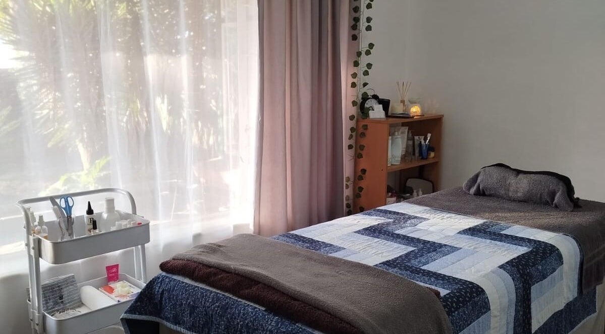Peaceful treatment room at Mekyla Wellness in Gqeberha, Eastern Cape, ZA, offering a tranquil ambiance for relaxation.