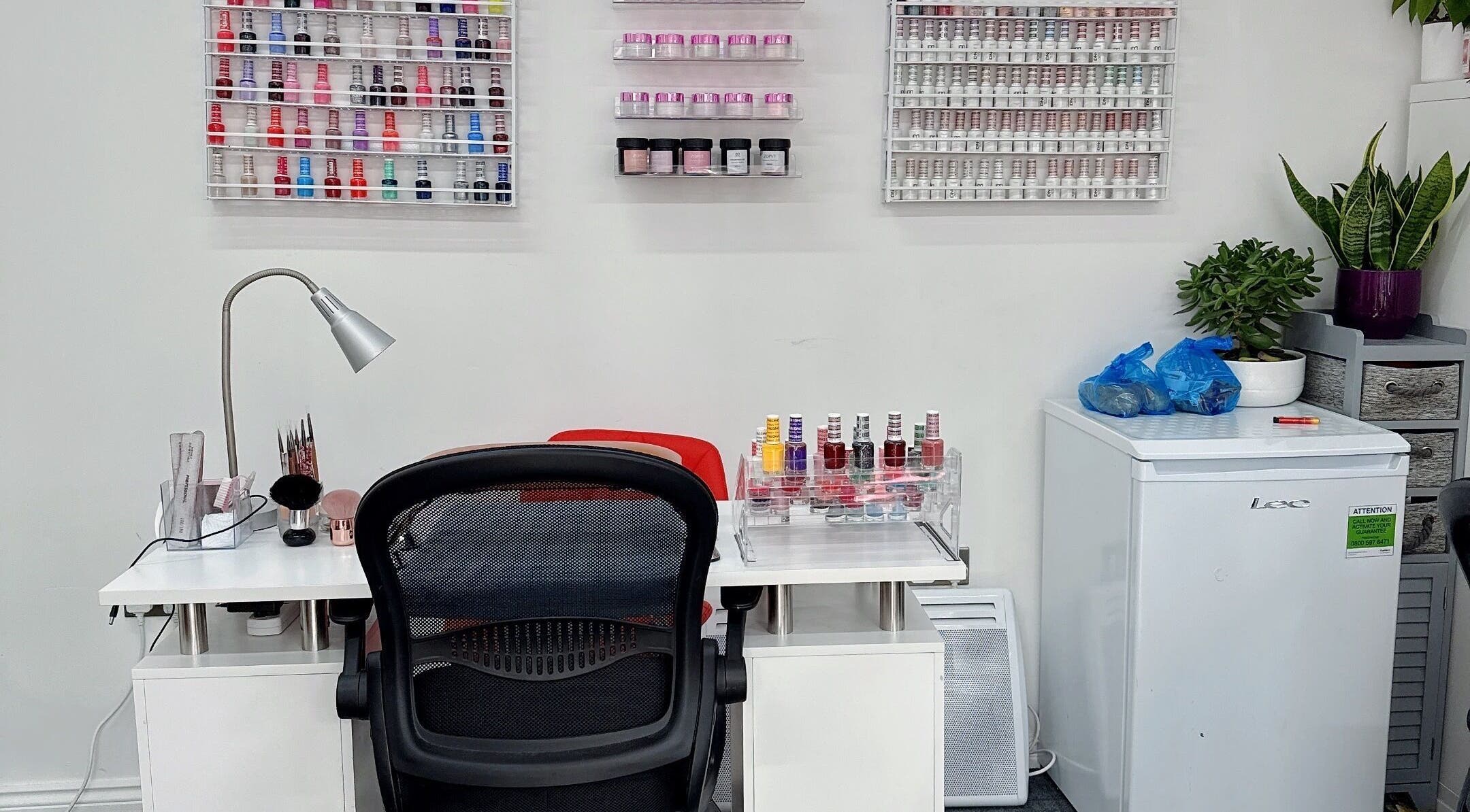 Manicure station at Willownails, Bristol, Willsbridge, GB with colorful polish display and tidy setup.