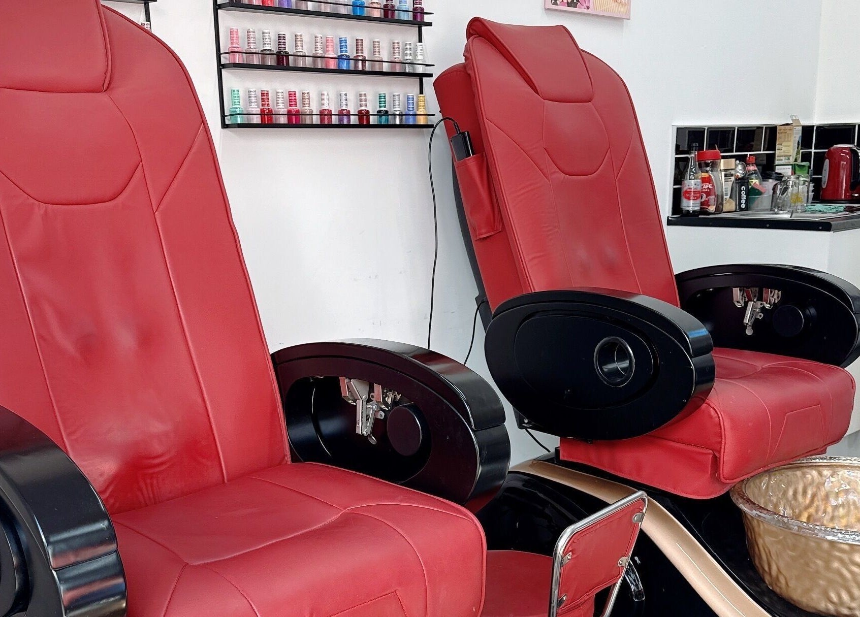 Luxurious red pedicure chairs at Willownails, Bristol, Willsbridge, GB, offering a premium nail experience.