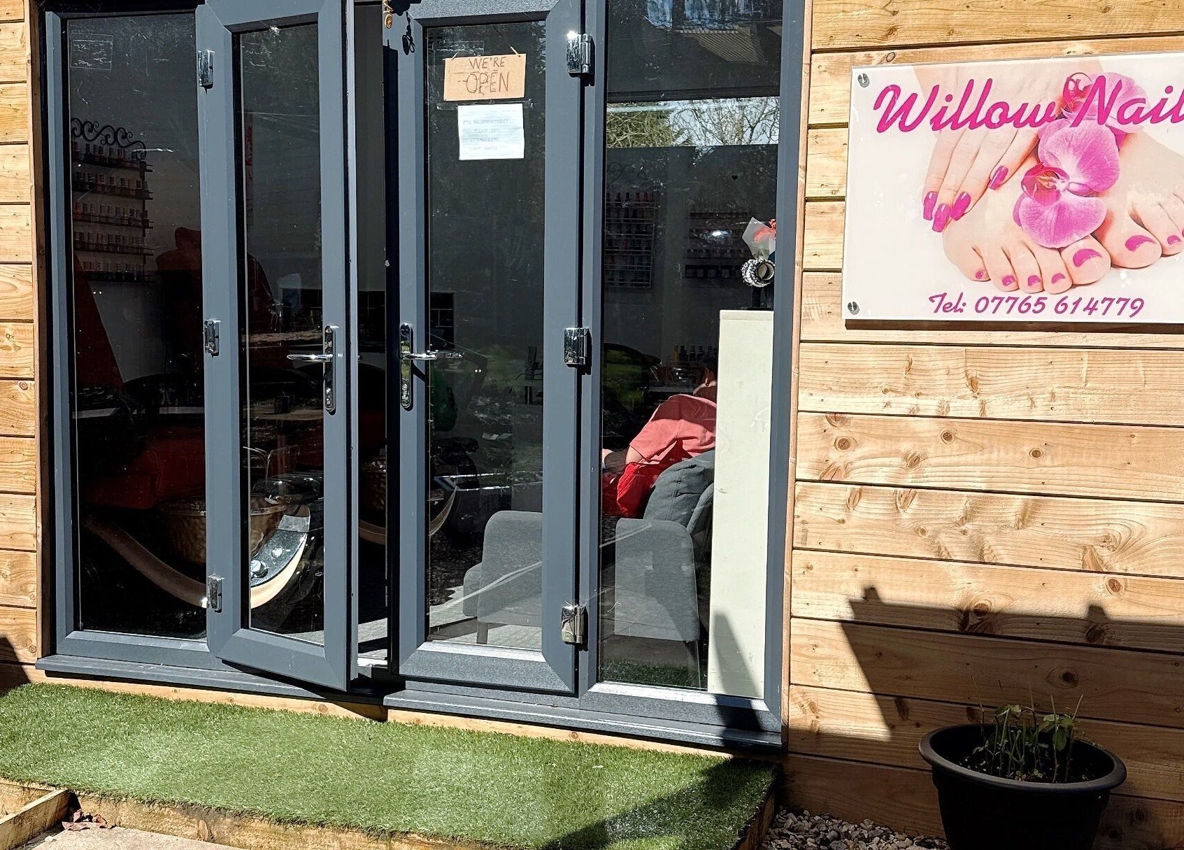 Entrance to Willownails with open doors and sign in Bristol, Willsbridge, GB.