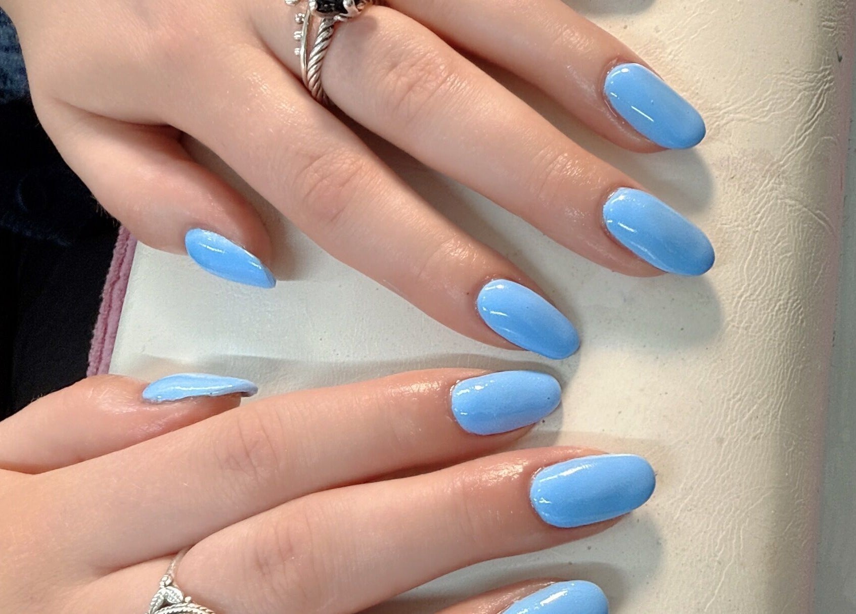 Sky blue manicure at Willownails, Bristol, Willsbridge, GB, showcasing glossy nails with intricate rings.