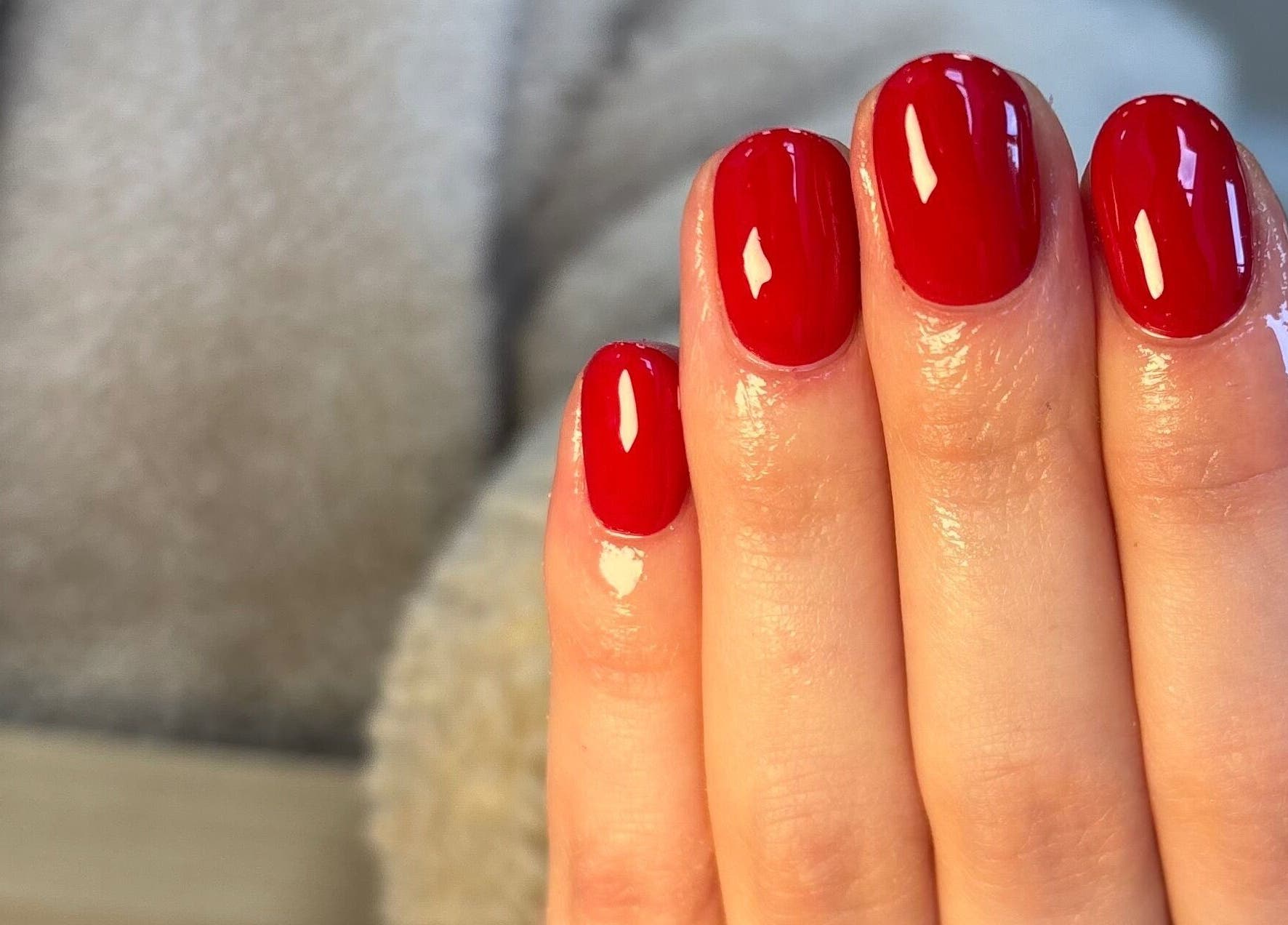 Chic red manicure at Ibrowednlashed, Glasgow, Scotland, GB. Perfectly polished for a bold look.