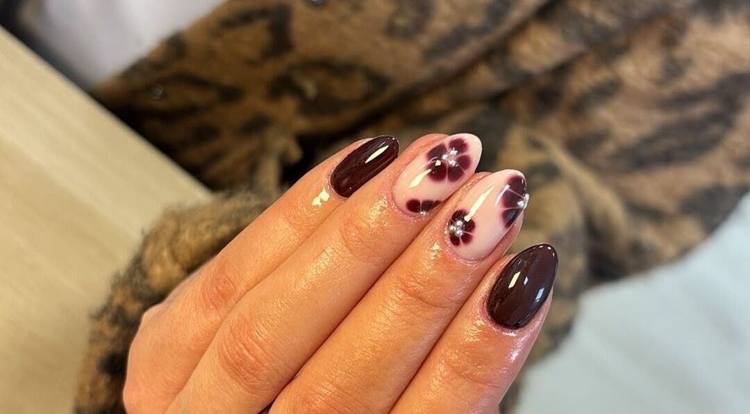 Stylish floral nail design at Ibrowednlashed, Glasgow, Scotland, GB.