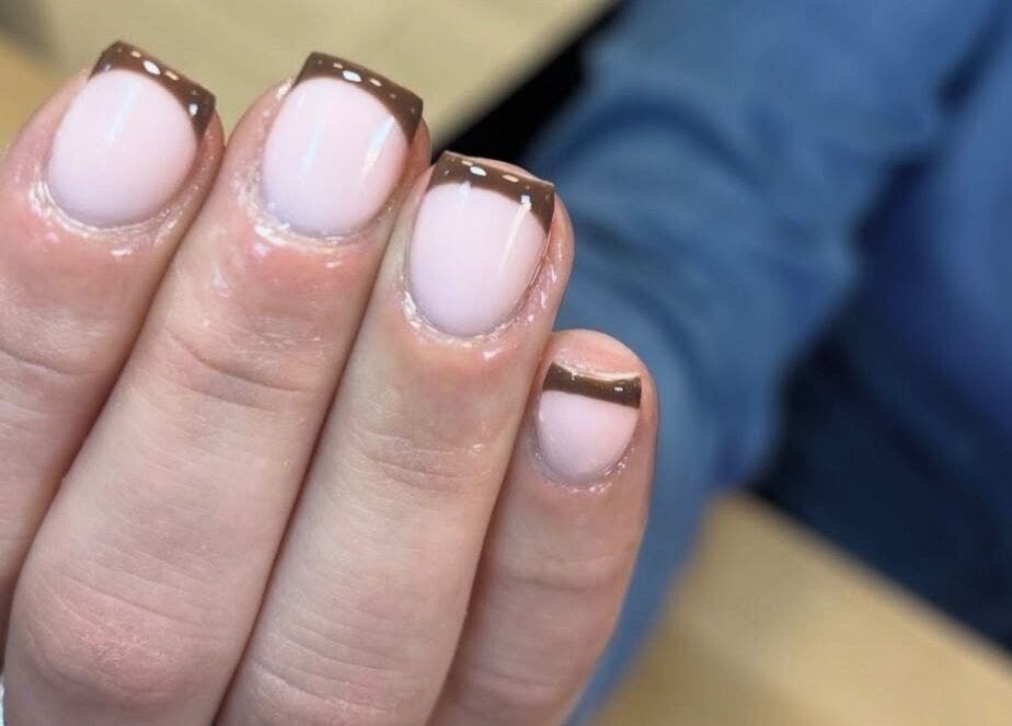 Brown French manicure at Ibrowednlashed, Glasgow, Scotland, GB; elegant nail art for modern style.