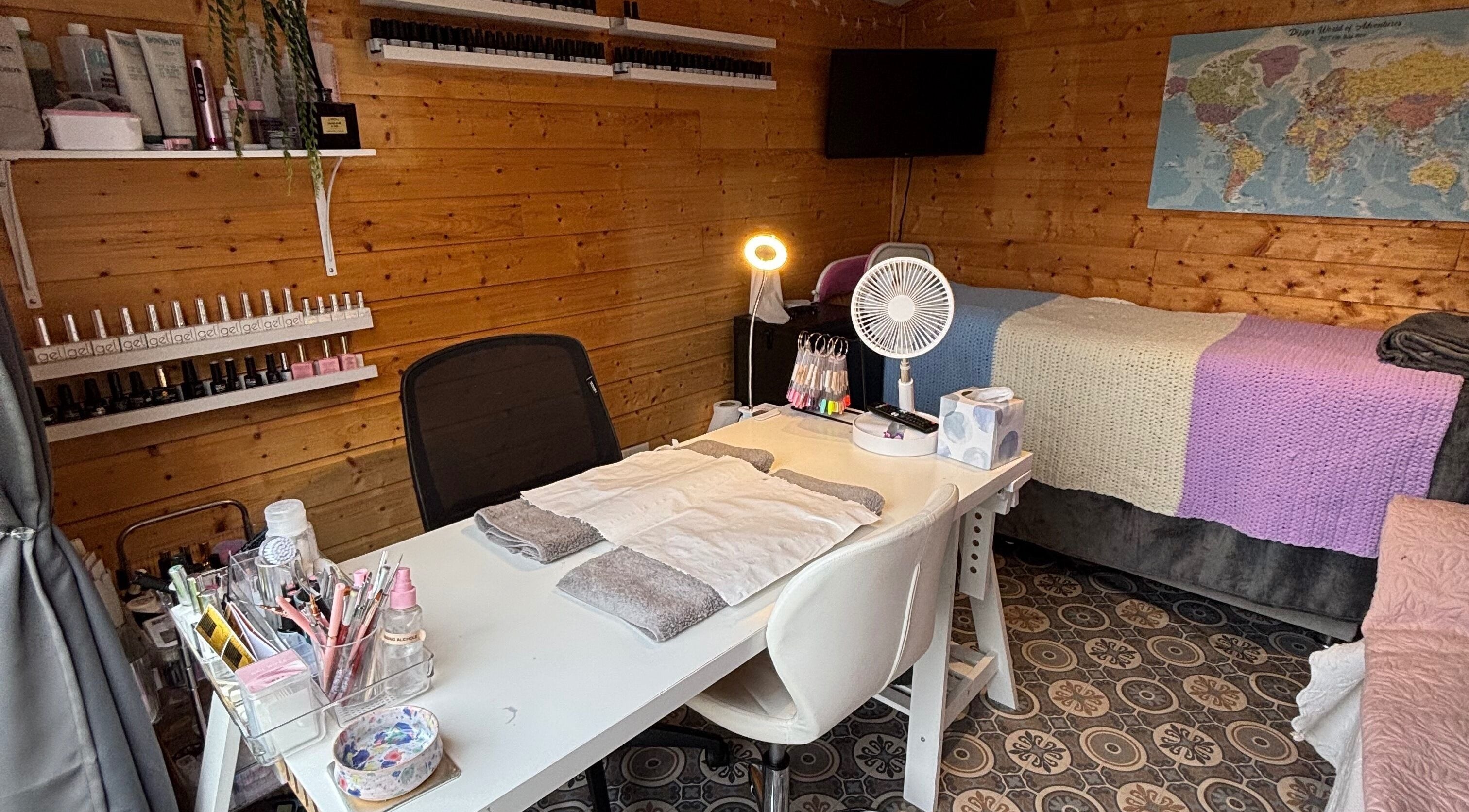 HSbeauty salon in Maidstone, England, GB features a well-equipped, cozy beauty treatment room with wooden decor.