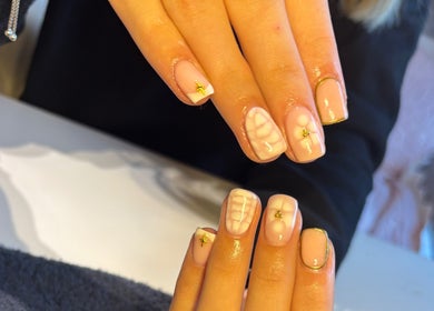 Elegant nail art with star accents at HSbeauty, Maidstone, England, GB.