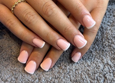 Fresh French manicure at HSbeauty, Maidstone, England, GB. Showcase of polished, natural nail design.