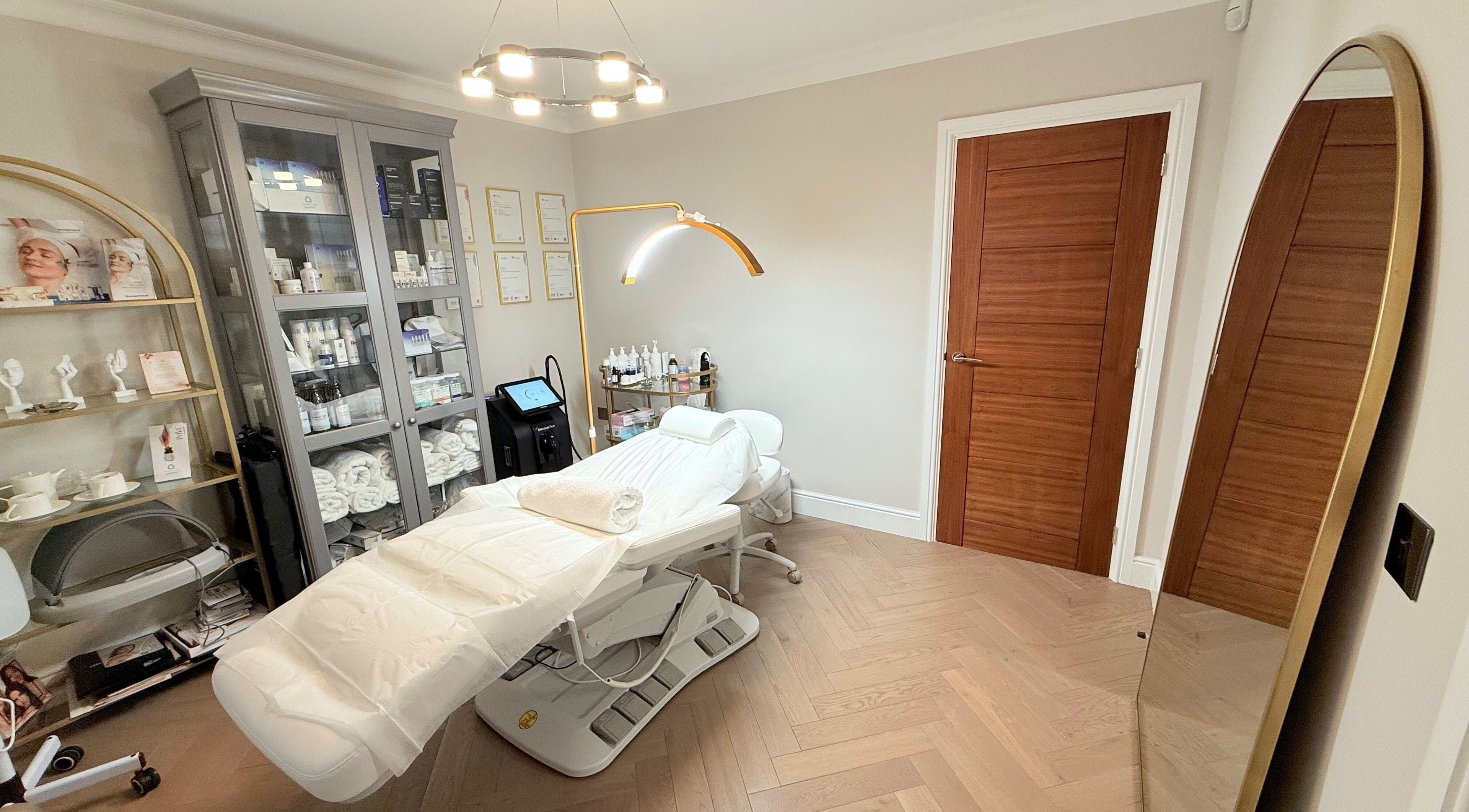 Treatment room at OGskinhouse, Crowthorne, England, GB with deluxe equipment and soothing ambiance.