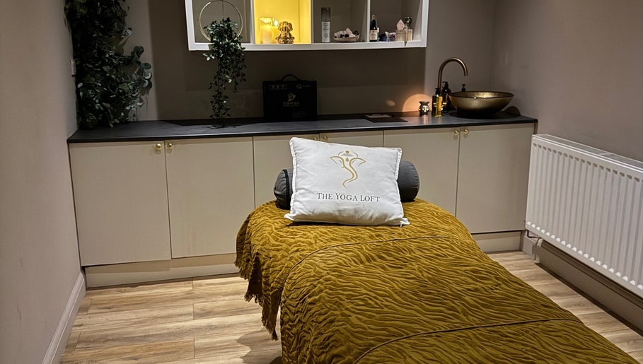 Tranquil therapy room at Sportstherapybygeorgia, Prescot, England, GB with massage bed and elegant decor.