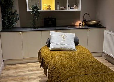 Tranquil therapy room at Sportstherapybygeorgia, Prescot, England, GB with massage bed and elegant decor.