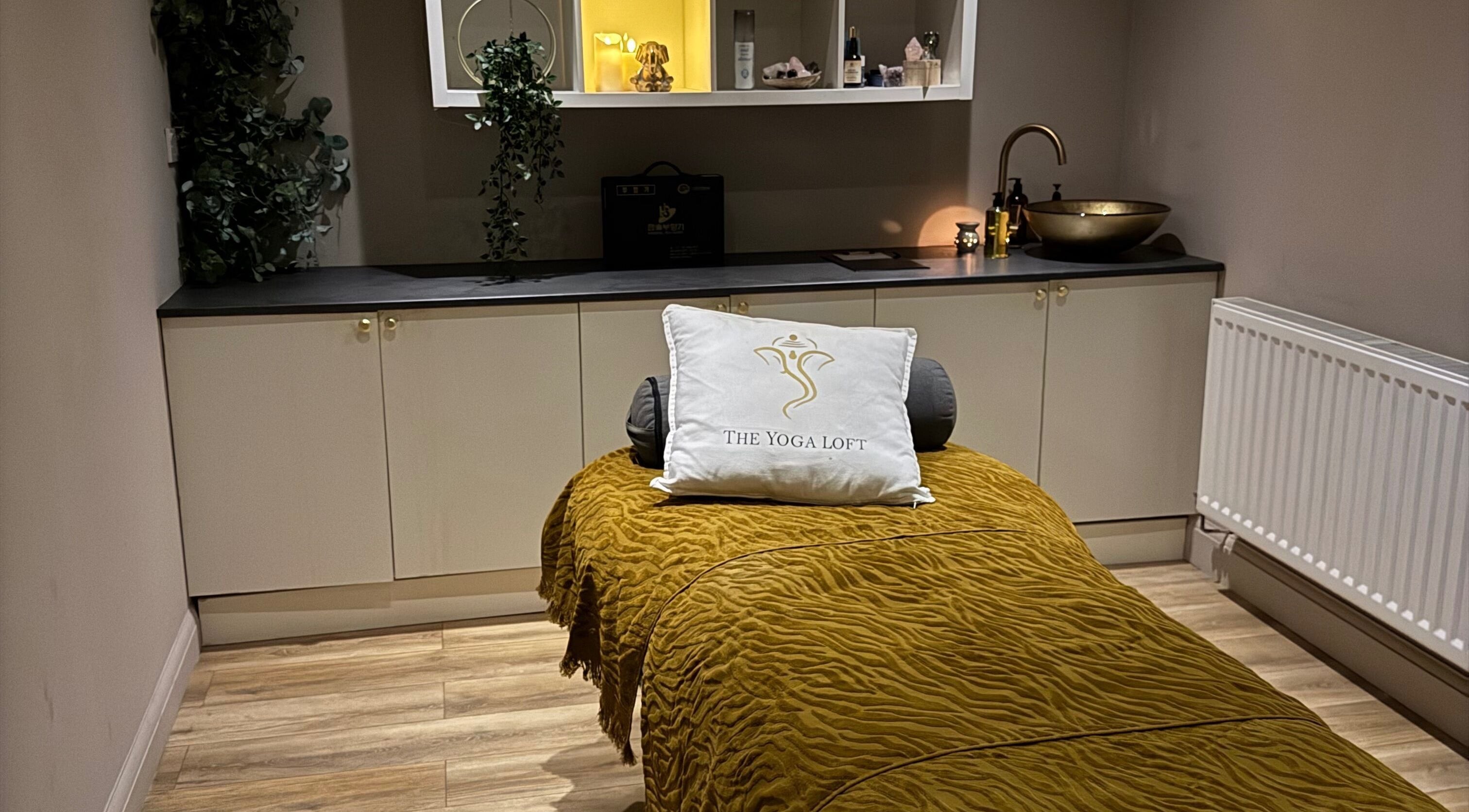Tranquil therapy room at Sportstherapybygeorgia, Prescot, England, GB with massage bed and elegant decor.