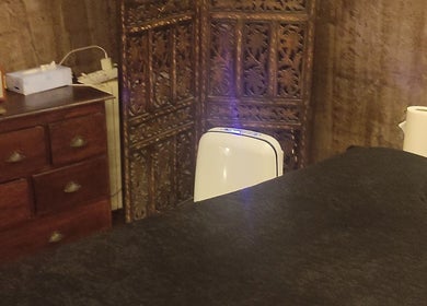 Salle de bien-être chez Janesophrologue à Paris, Île-de-France, FR, avec décoration chaleureuse.