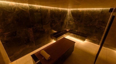 Luxurious treatment room at SUSAN CHANEL BEAUTY SKINLINE - ALLEN in Ikeja, Lagos, NG with dim ambient lighting.