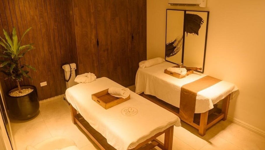 Massage room at SUSAN CHANEL BEAUTY SKINLINE - ALLEN, Ikeja, Lagos, NG with two beds and spa decor.