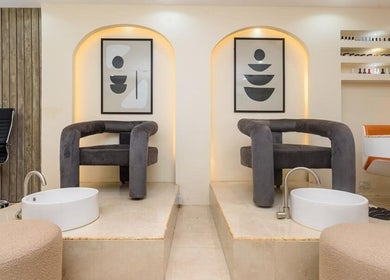 Stylish pedicure chairs at SUSAN CHANEL BEAUTY SKINLINE - ALLEN, Ikeja, Lagos, NG, offering a serene experience.