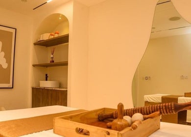 Elegant treatment room at SUSAN CHANEL BEAUTY SKINLINE - ALLEN, Ikeja, Lagos, NG with warm decor and cozy ambiance.