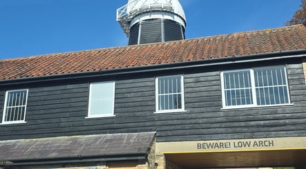 STUDIO19 at charming rustic building with observatory in Cambridge, England, GB under clear blue sky.