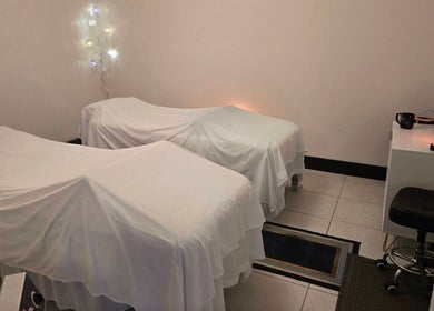 Tranquil massage beds at K Day Spa, Naples, Florida, US, offering a peaceful wellness experience.