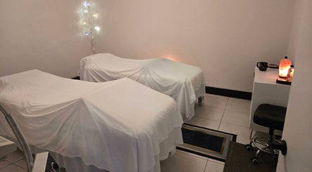 Tranquil massage beds at K Day Spa, Naples, Florida, US, offering a peaceful wellness experience.